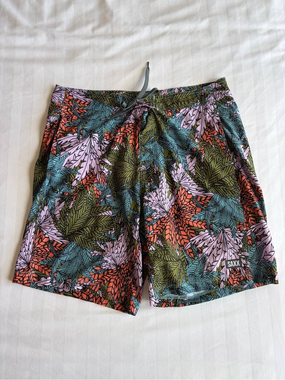 SAXX- size 36 Betawave Swim Boardshorts in the Sub Tropic Multi color pattern.